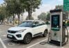 Delhi Passes Its Charging Target Three Months Early Public electric vehicle charging station with a white EV parked and charging in Delhi