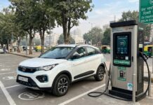Delhi Passes Its Charging Target Three Months Early Public electric vehicle charging station with a white EV parked and charging in Delhi