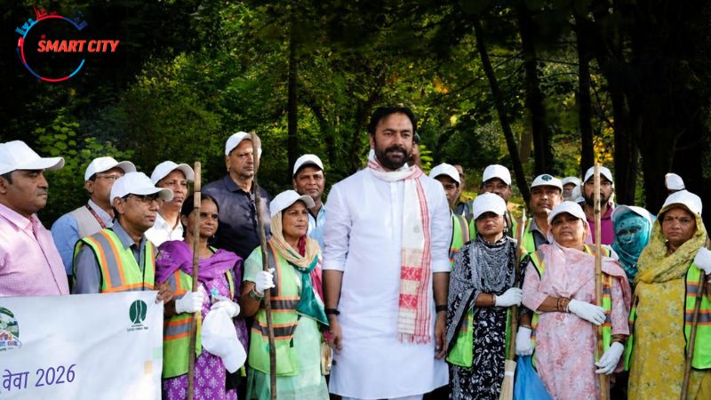 Union Minister G. Kishan Reddy and Mines Secretary Keshav Chandra with sanitation workers holding brooms during Swachhata Seva 2026 drive